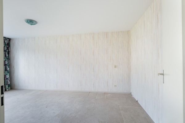 Foto - Te koop: Ruime dubbele benedenwoning met parkeerplaats!